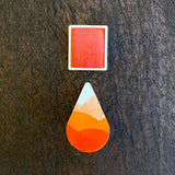 watercolour half pan and ombre droplet swatch of Papaya watercolour paint